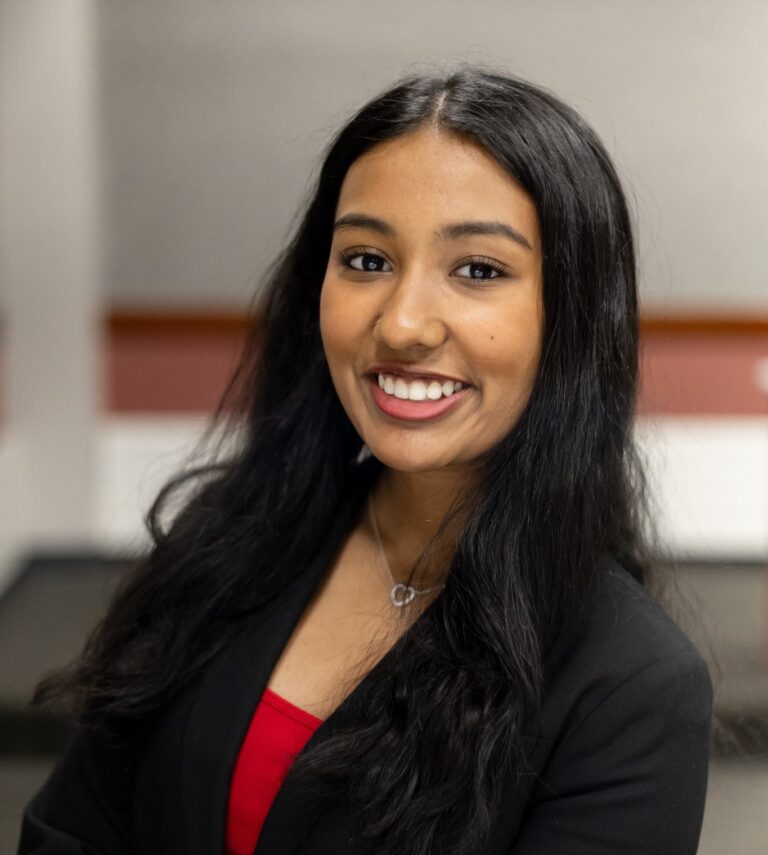 Headshot of Freedom Seekers Intern Rhea Yenubari